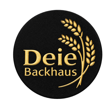 Schwarze Pfandmarke Deie Backhaus mit goldfarbenem Aufdruck